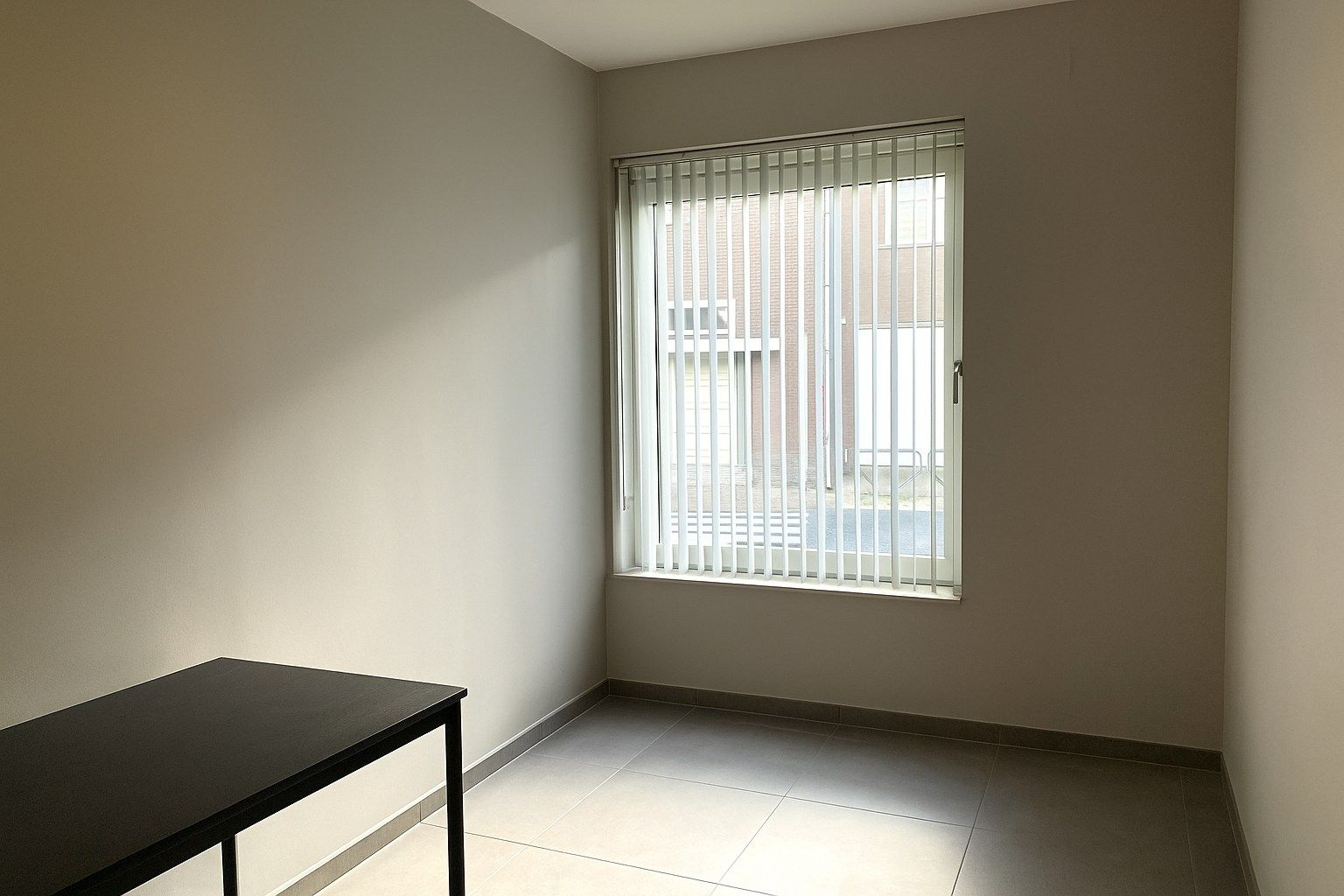 GELIJKVLOERS APPARTEMENT MET TERRAS EN GARAGE foto 8