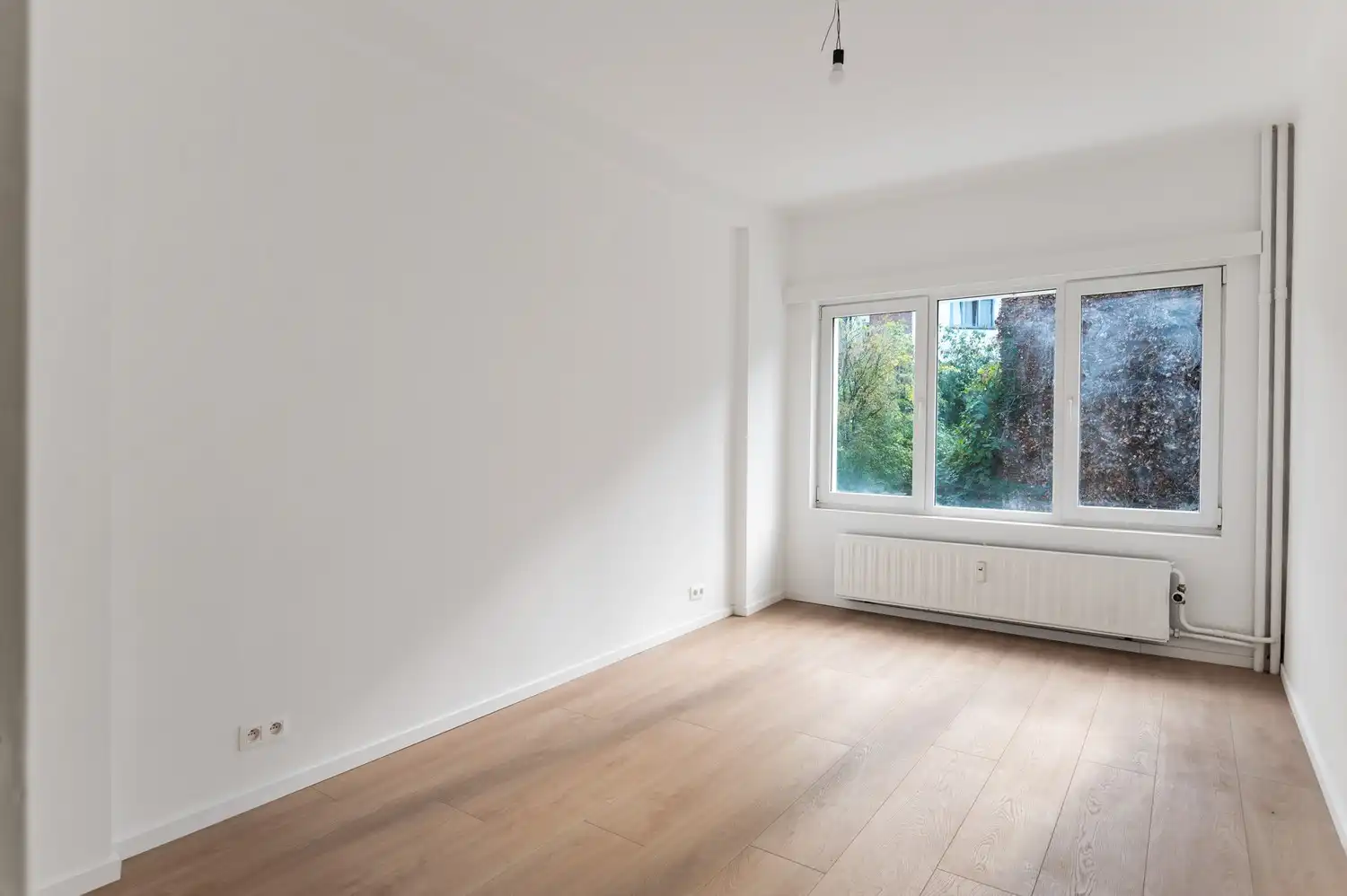 Licht en ruimte in het hart van Antwerpen – 1 slaapkamer appartement foto 10