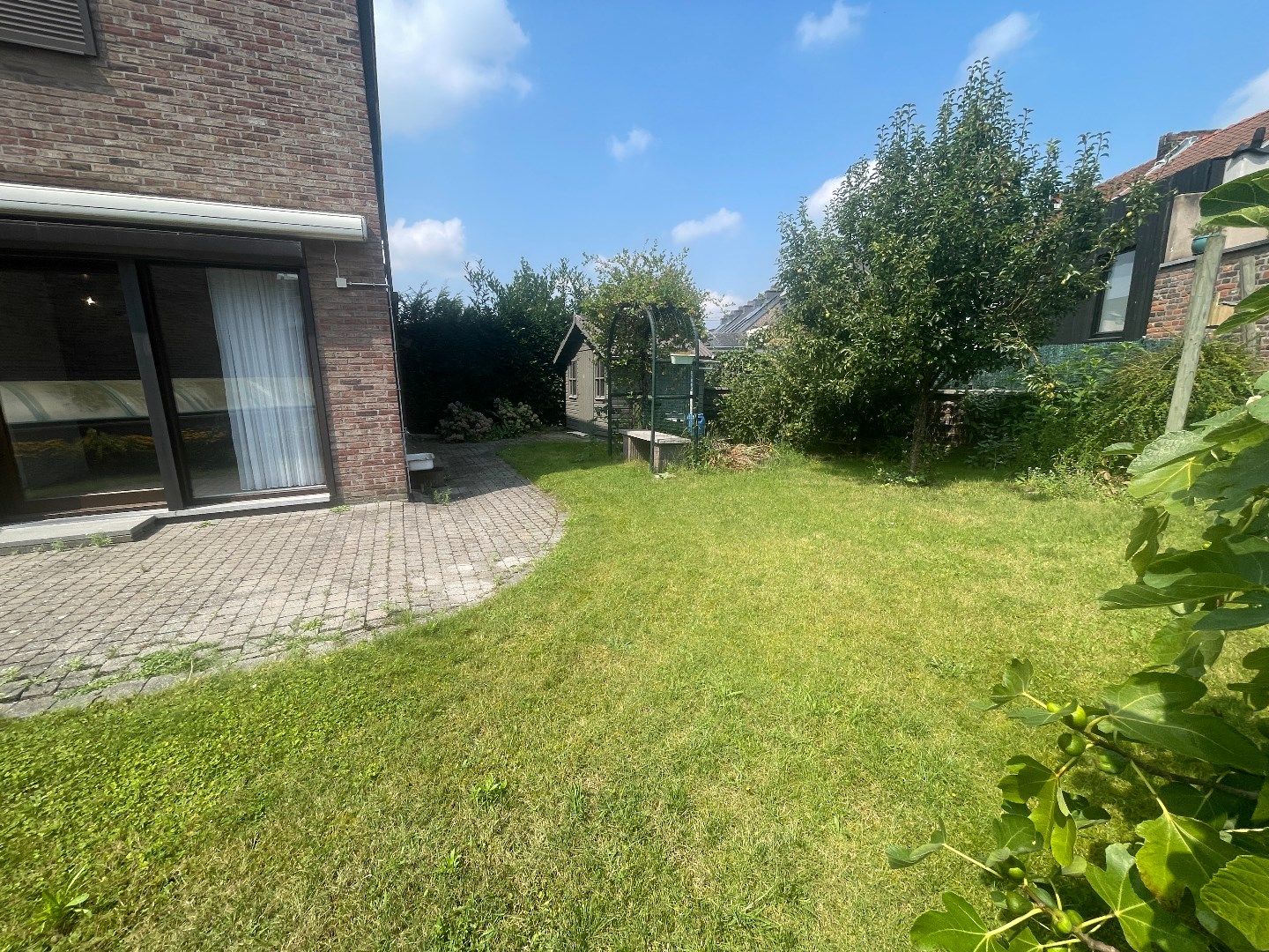 Ruime stadswoning met tuin, terras en ondergrondse garage in Hasselt - 4 slaapkamers - bouwjaar 1993 - EPC-waarde 206.Kwh - Energielabel C - 140.00m² bewoonbare foto 5