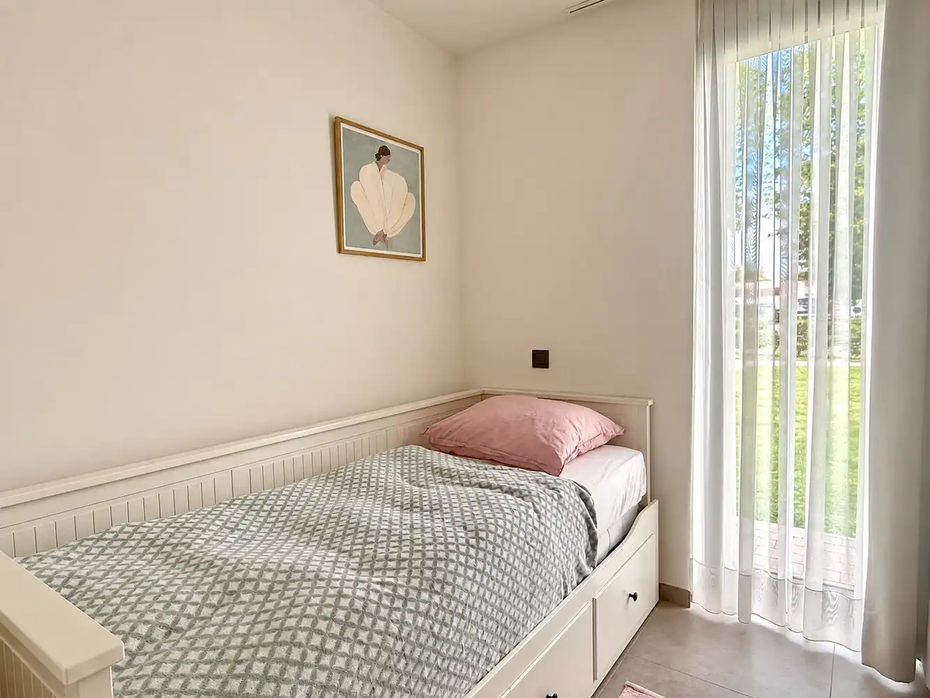 Modern gelijkvloers appartement met drie slaapkamers en gezellig tuintje foto 13