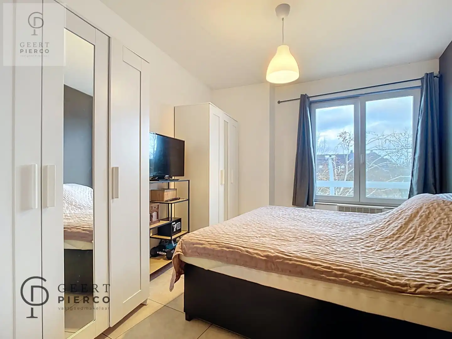 Ruim appartement met twee slaapkamers, kelder en ondergrondse staanplaats. foto 10