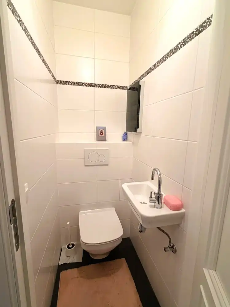 Instapklaar, prachtig gerenoveerd 2-slaapkamerappartement MET garagebox foto 15