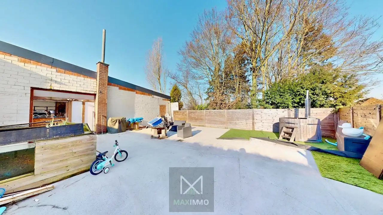 Gelijkvloerse bungalow met loods van 180 m² in het centrum van Marke foto 24