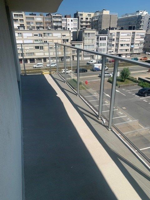 Ongemeubeld appartement met frontaal zeezicht vooraan en zicht op Wellington golf achteraan, 3 terrassen foto 7