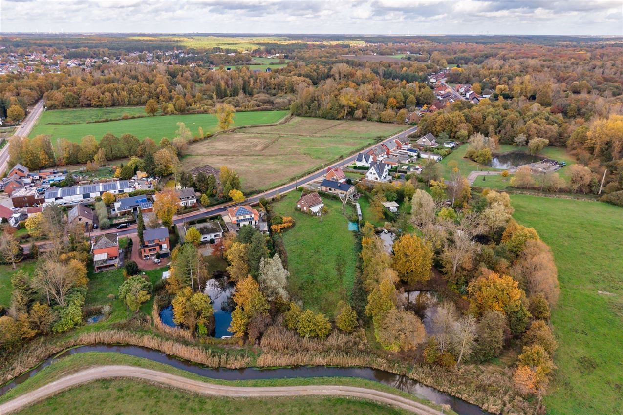 Uniek perceel van 50a33ca met af te breken woning aan agrarisch gebied foto 7