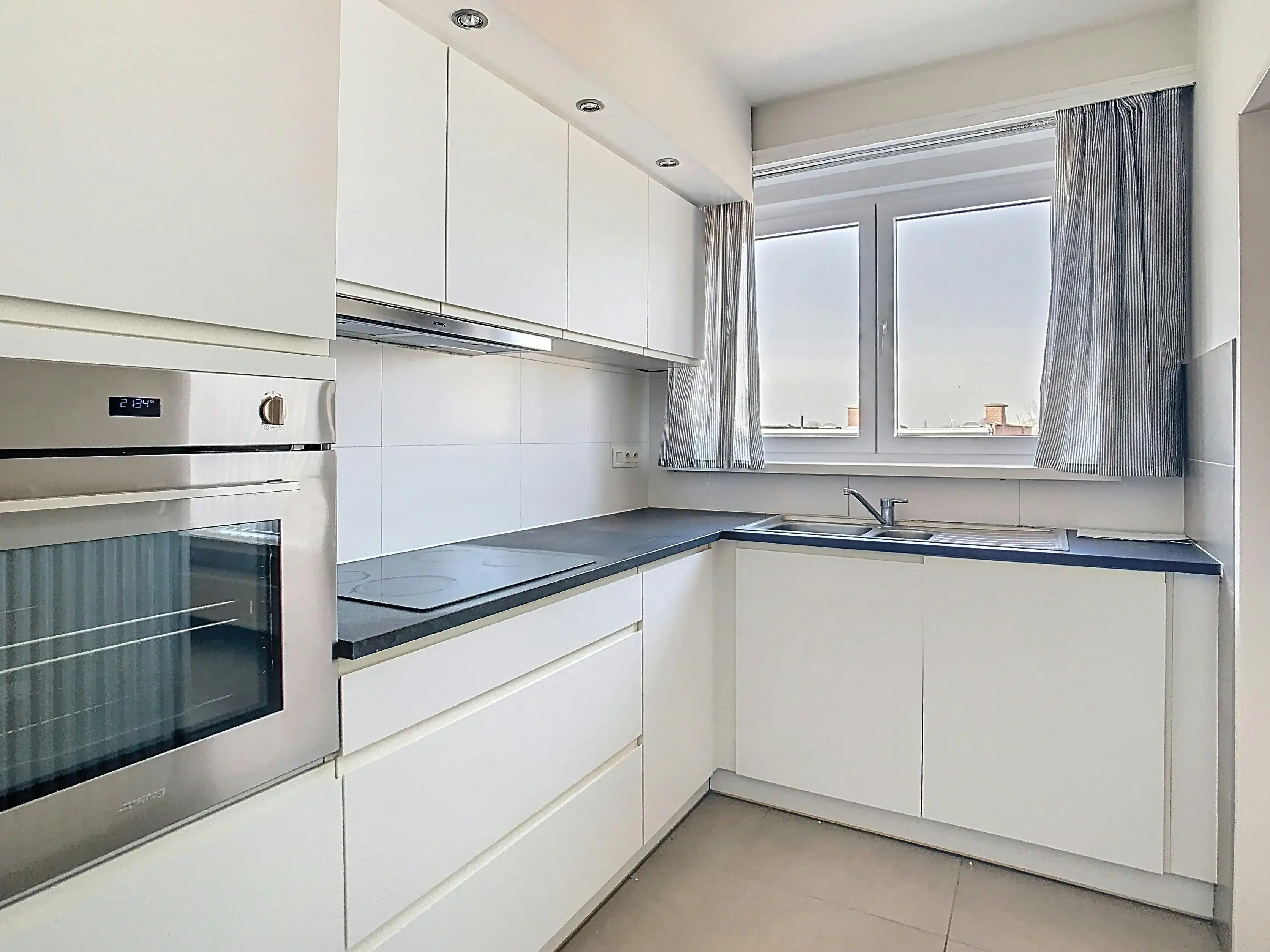 Gemoderniseerd appartement met 2 slpkmrs (garage mogelijk) foto 6