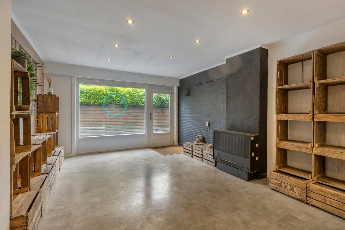 Te renoveren woning met grote tuin en bijgebouw te Heule foto 2