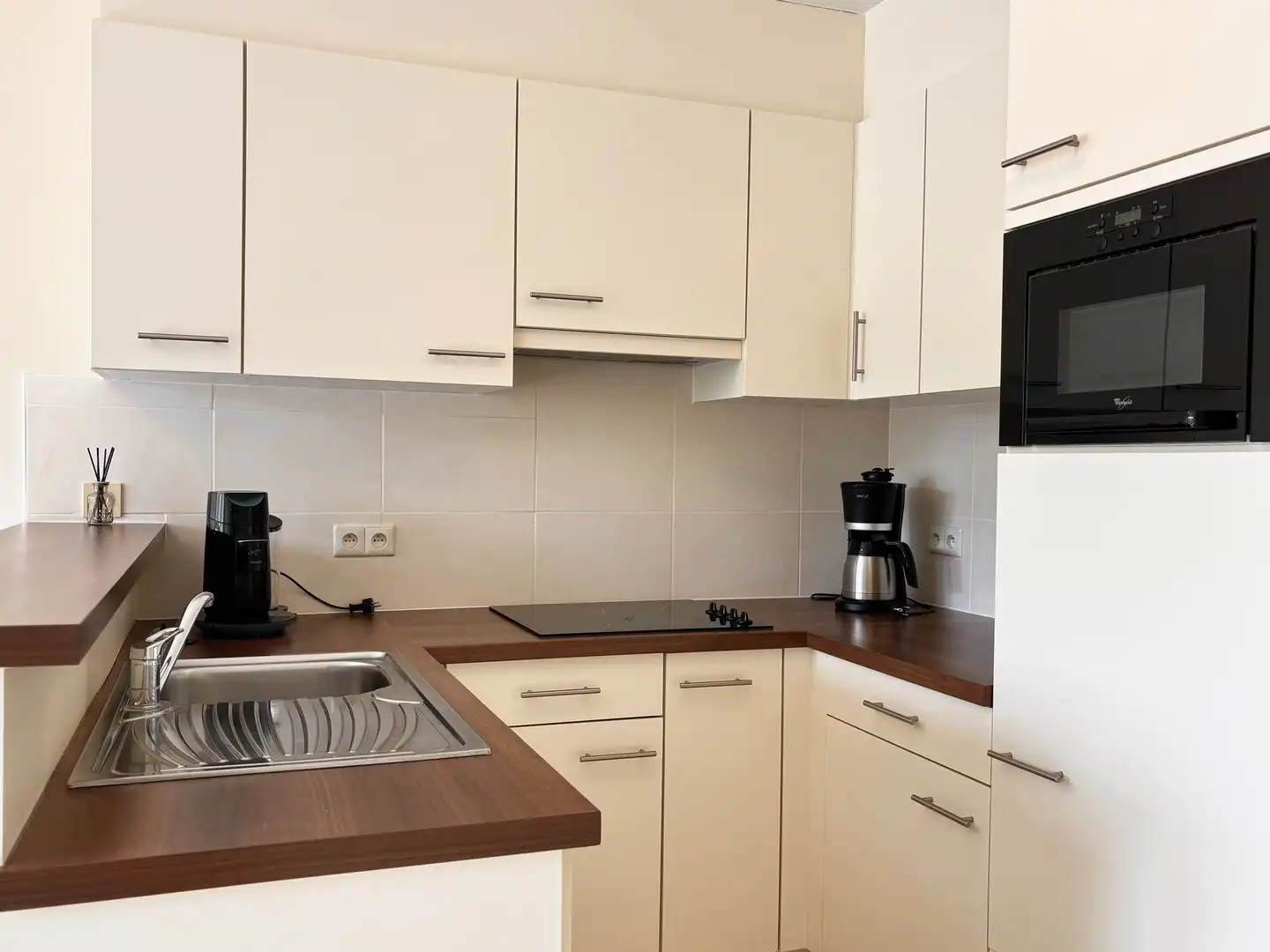 Zonnig appartement met slaapkamer en slaaphoek. foto 4