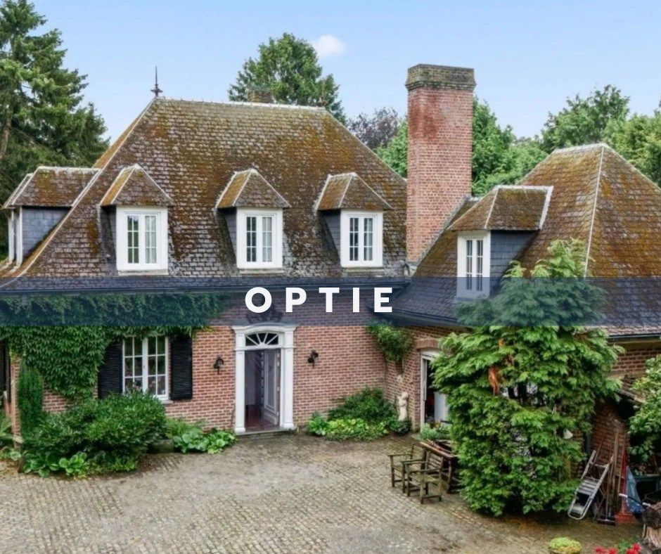 Hoofdfoto van de publicatie: UNIEK LANDHUIS TE OTTENBURG!