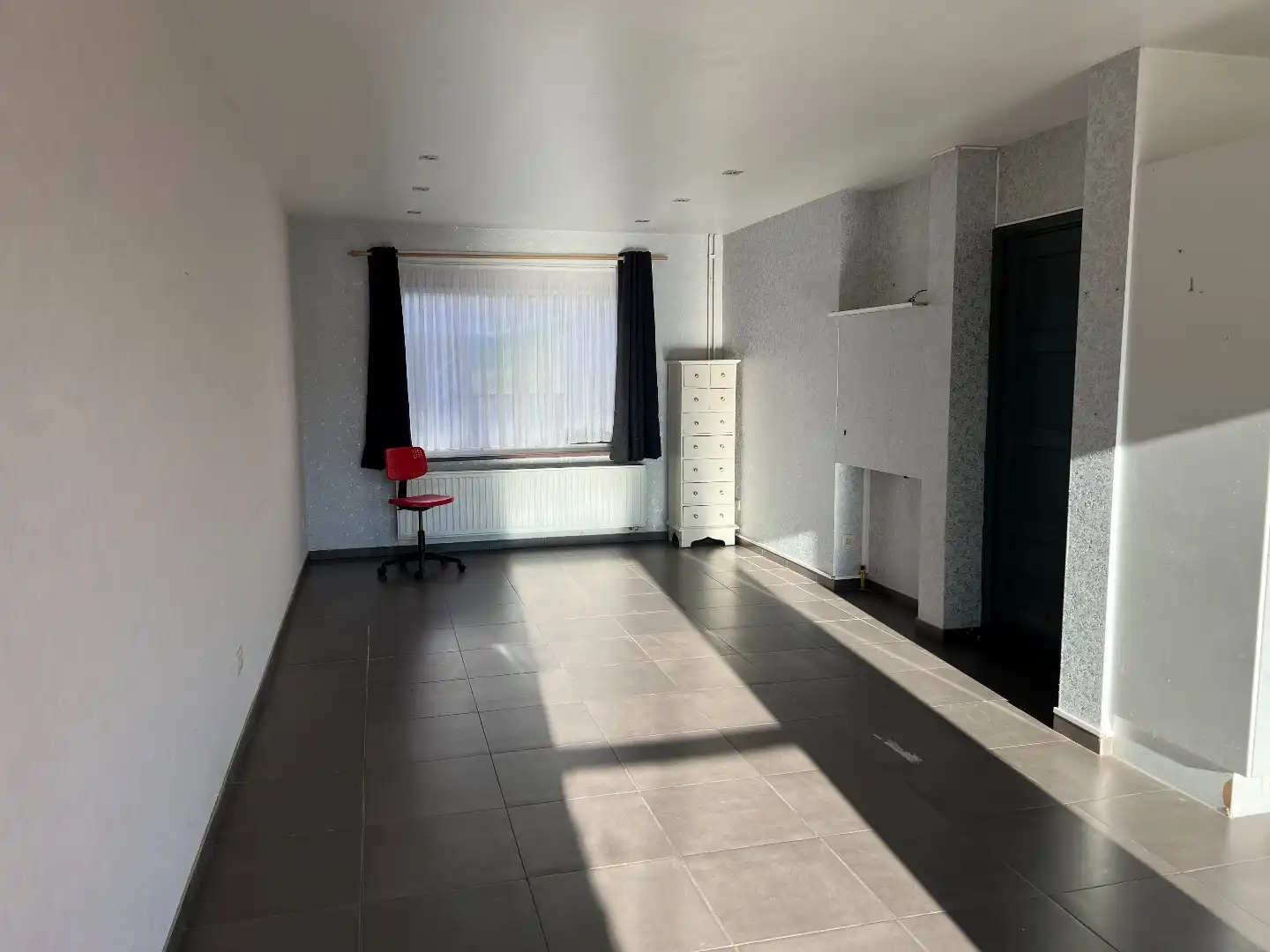 Vernieuwde rijwoning te huur in hartje Westerkwartier te Oostende! foto 4