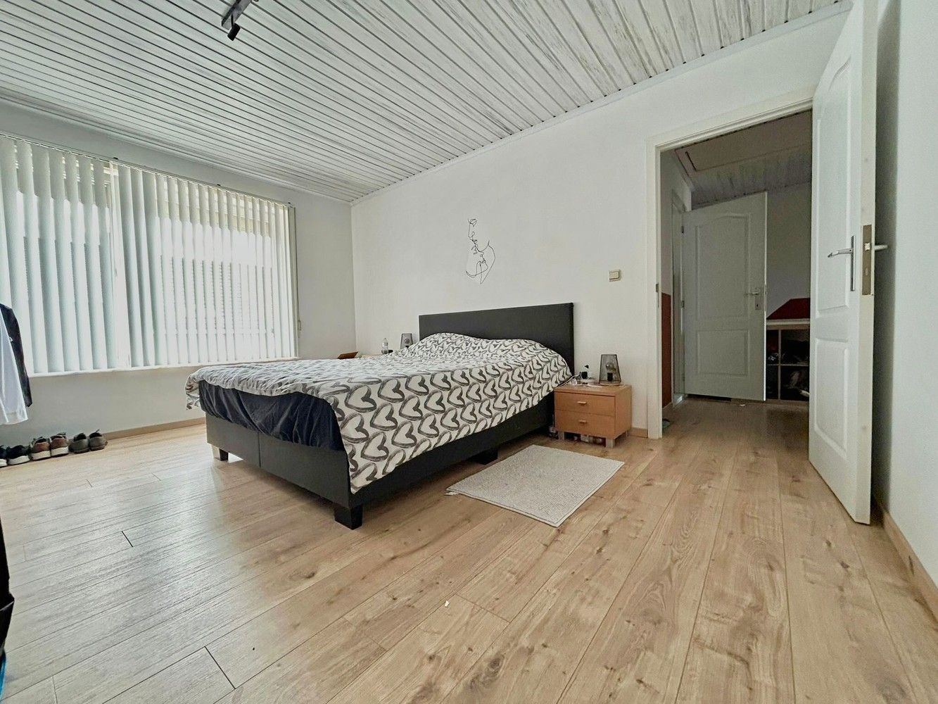 Ruime, lichtrijke woning met zonnige tuin+ aparte garage foto 14