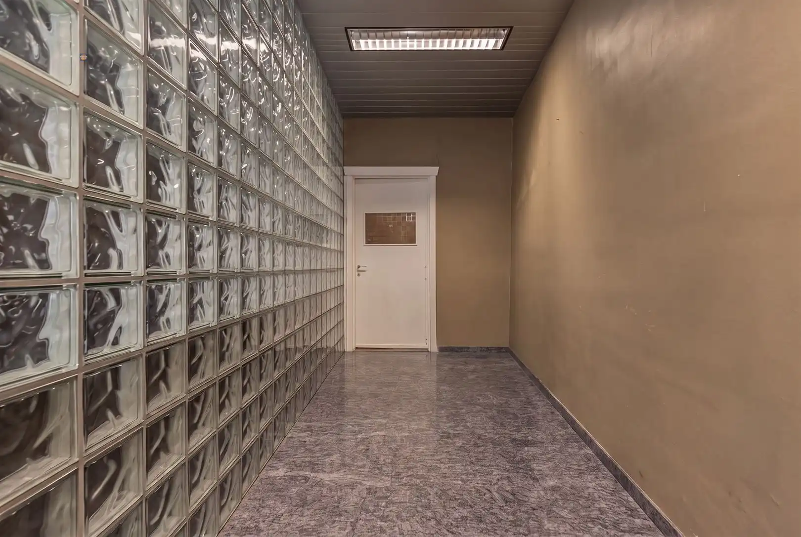 Opbrengsteigendom met handelsruimte en verhuurd duplex appartement in het centrum van Willebroek foto 12