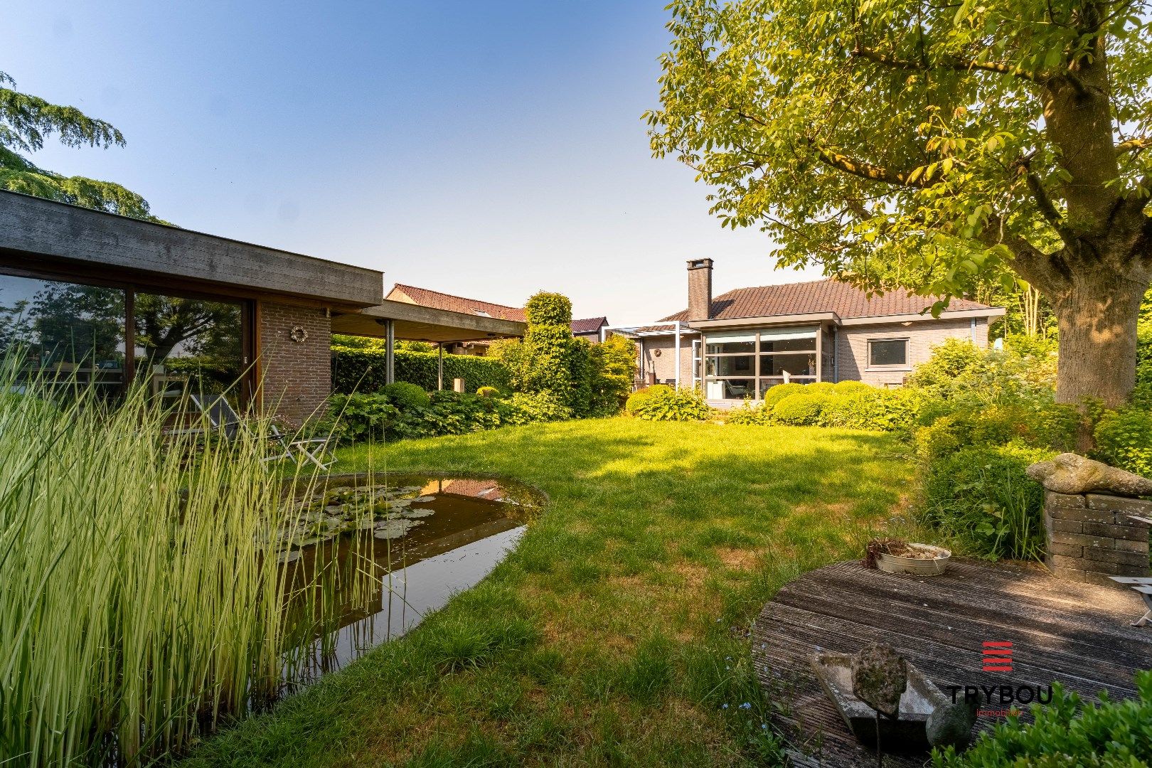 Unieke villa met atelier, aangelegde tuin en artistieke ziel foto 22