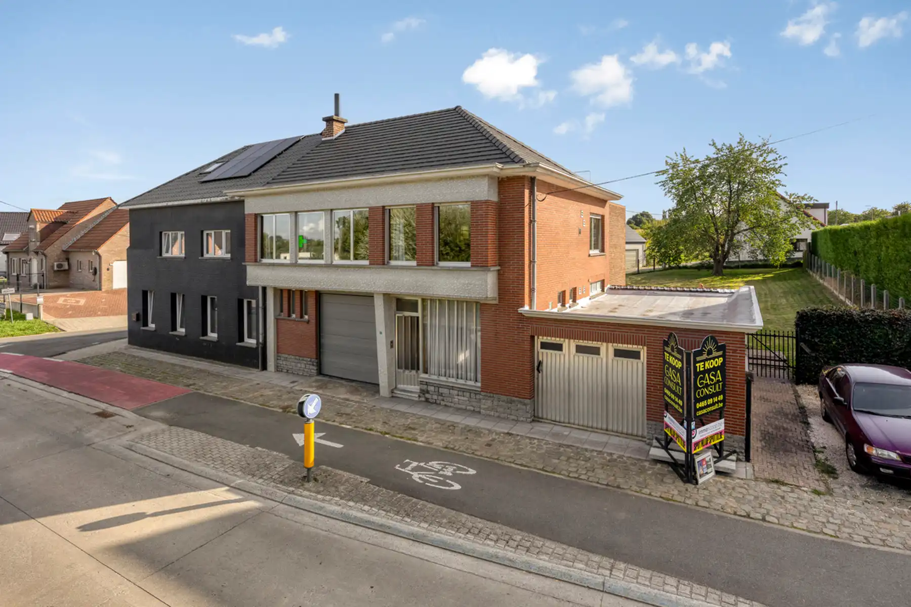 Hoofdfoto van de publicatie: Halfopen bebouwing met ruime garage/werkplaats en tuin!
