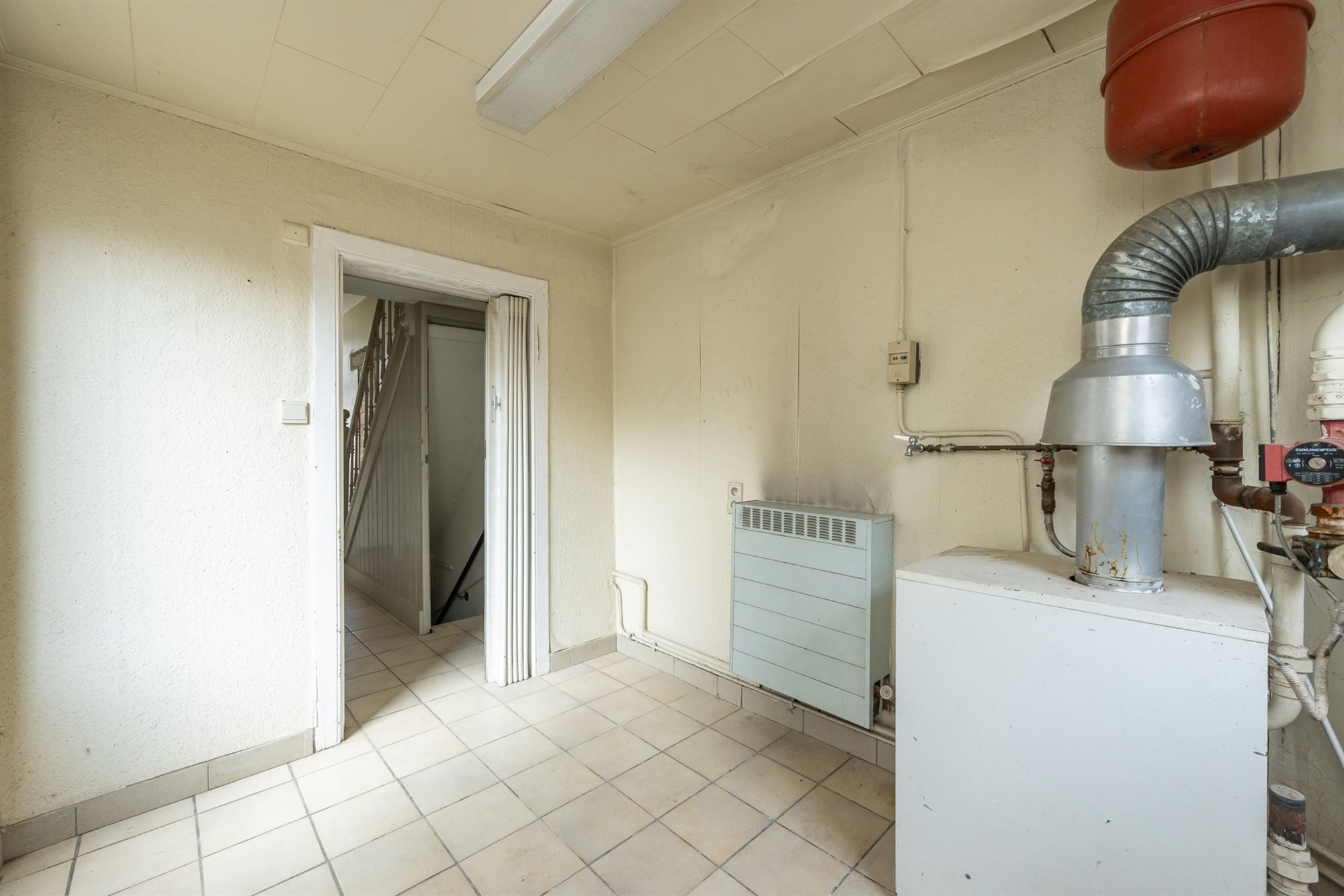 Gunstig gelegen renovatiewoning met 2 tot 4 slaapkamers foto 5