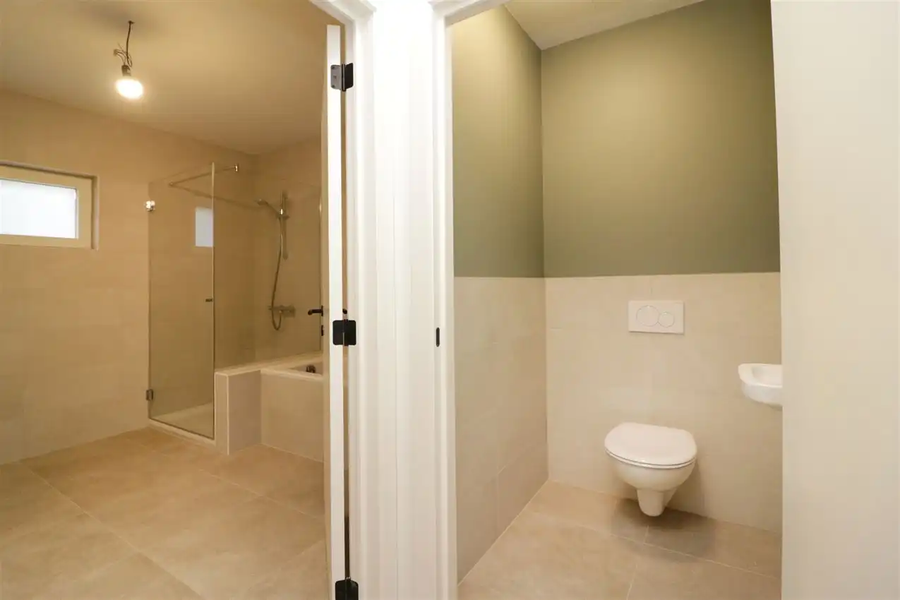 Gerenoveerde woning met 4 slpk, tuin, garage foto 14