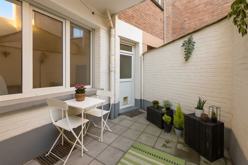 Instapklaar gelijkvloersappartement met stadskoer foto 8