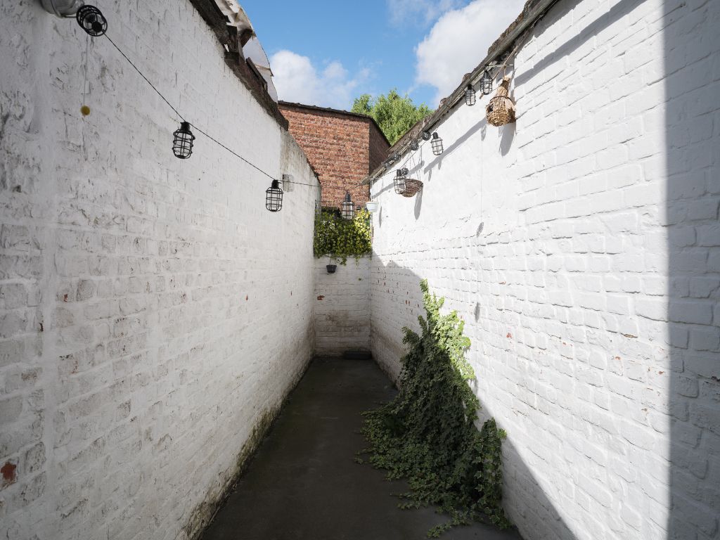 Lichtrijke en instapklare woning met stadskoer nabij Gent Centrum foto 3