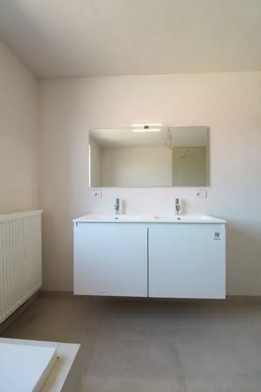 Halfopen nieuwbouwwoning met garage Roeselare foto 10