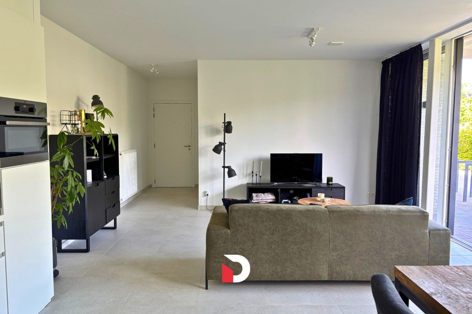 Modern gelijkvloers appartement met 1 slaapkamer en garagebox foto 2