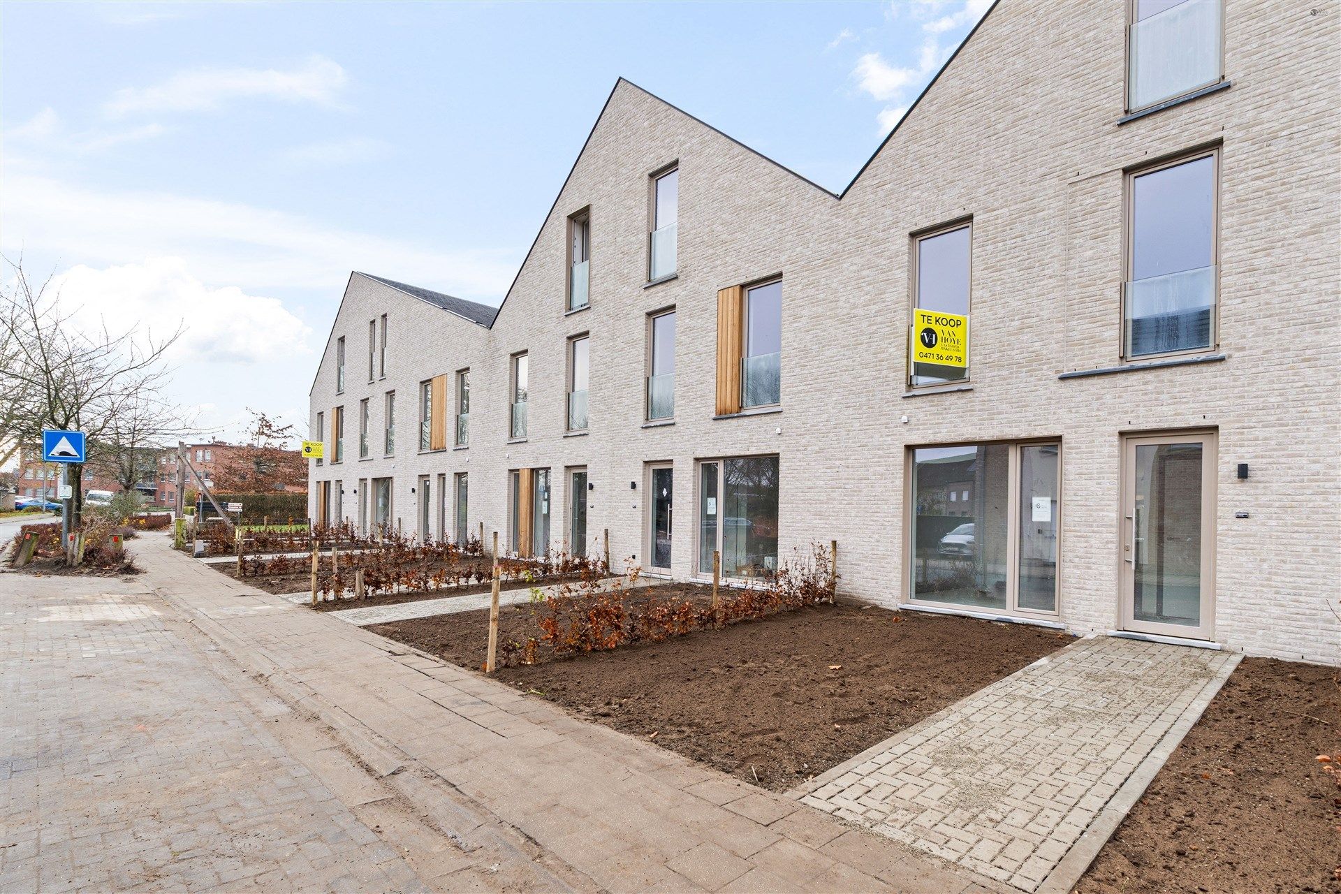 Kwalitatieve rijwoning te Vrasene foto {{pictureIndex}}