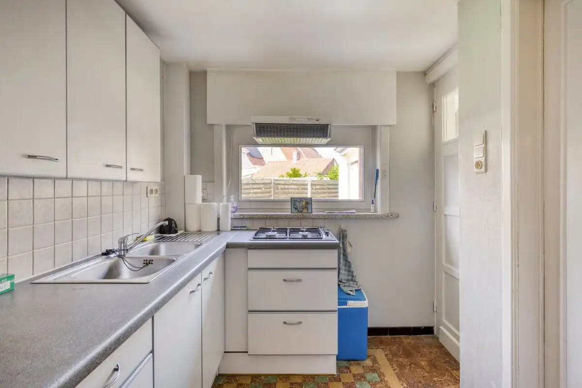 Woning met 2 slaapkamers, garage en tuin te koop in Kortrijk foto 8