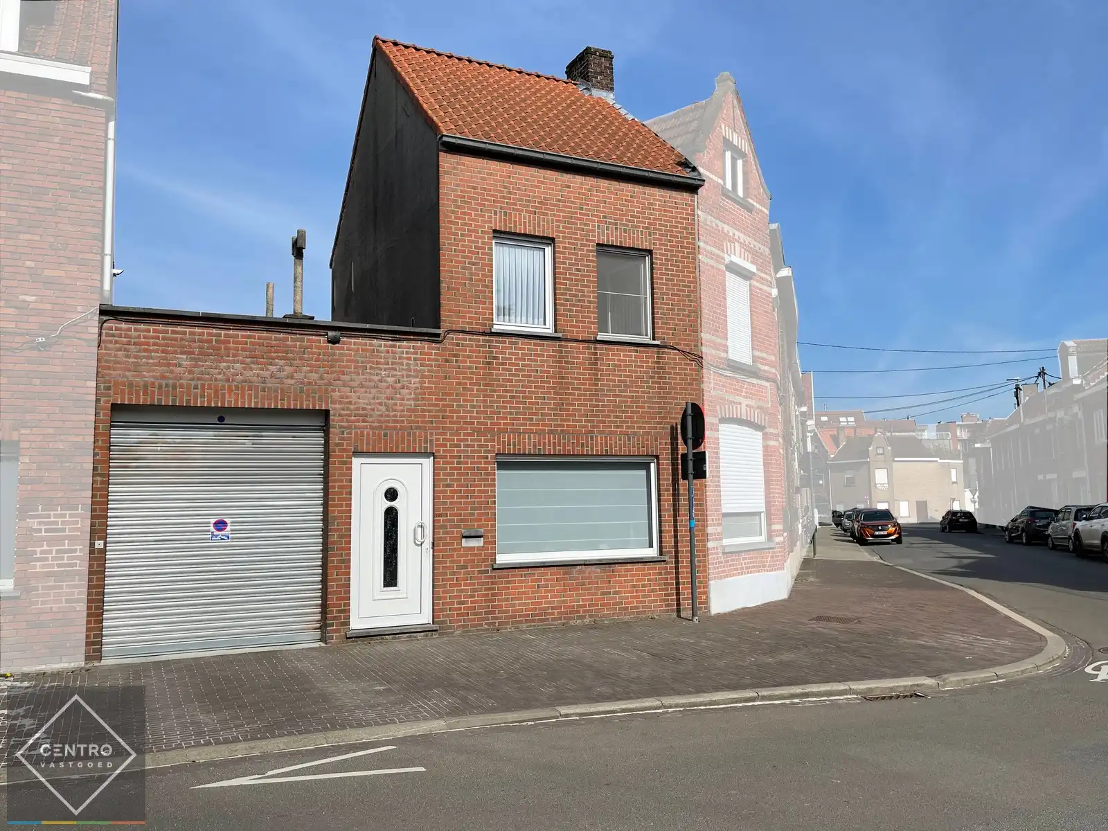 Centraal gelegen woning met 3 slpks, terras én garage! foto {{pictureIndex}}