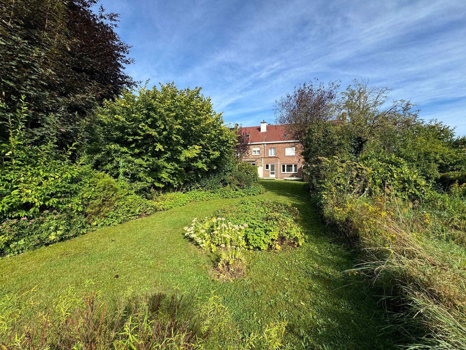 Rustig gelegen woning met 3 slaapkamers, garage en tuin foto 6