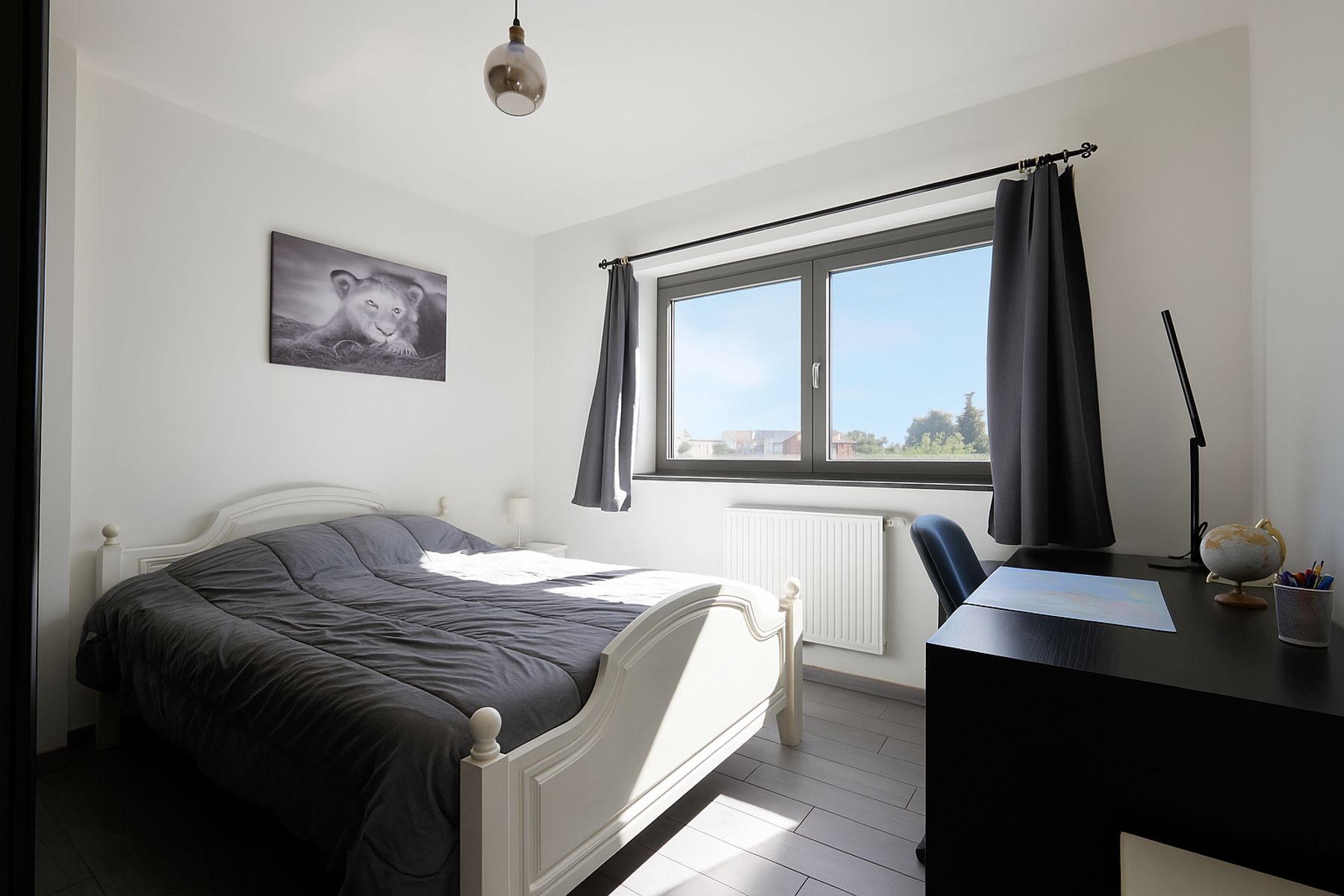 Klassevol 2 slaapkamerappartement met garage foto 12