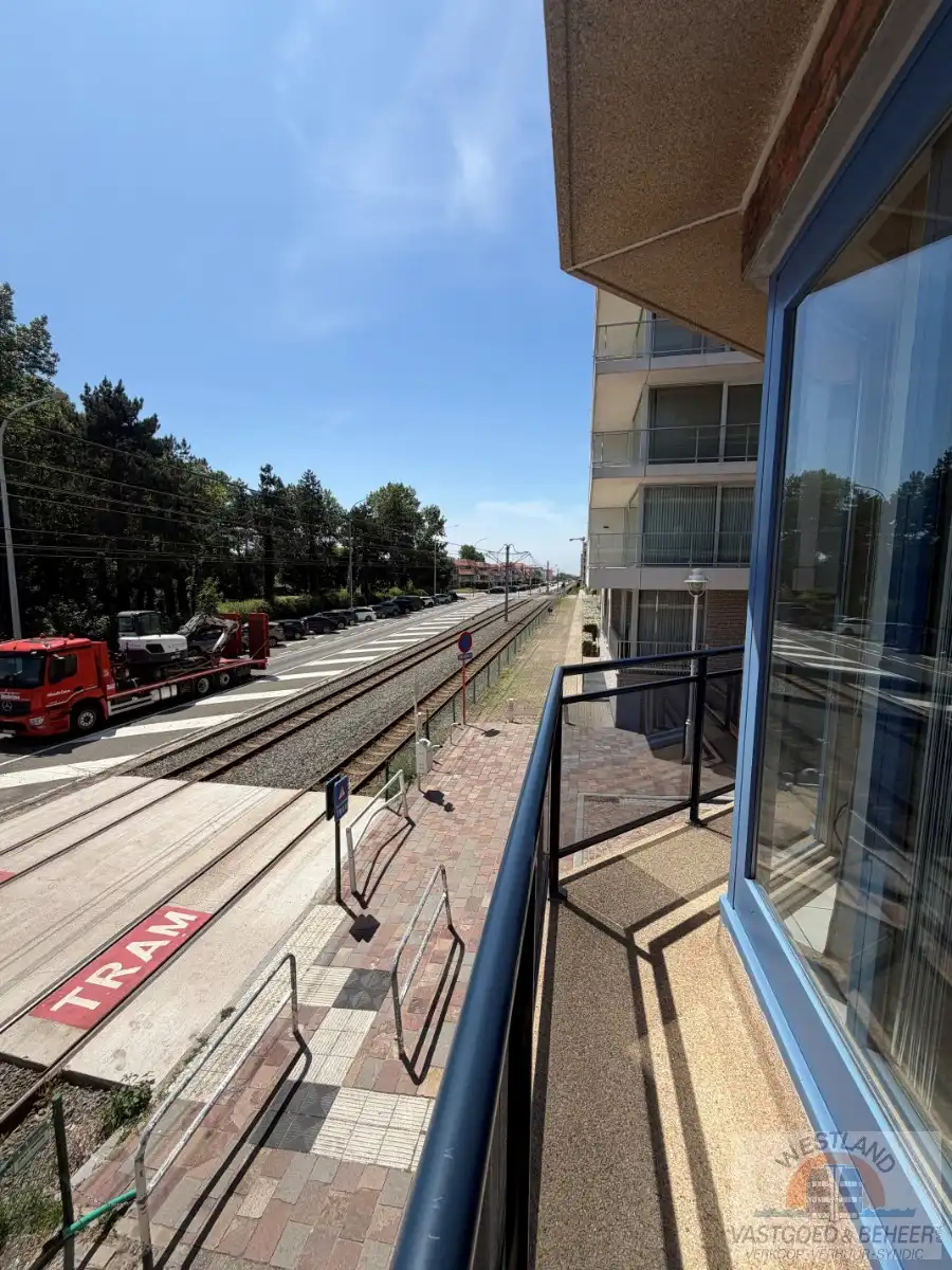 Lichtrijk hoekappartement met 1 slaapkamer foto 10