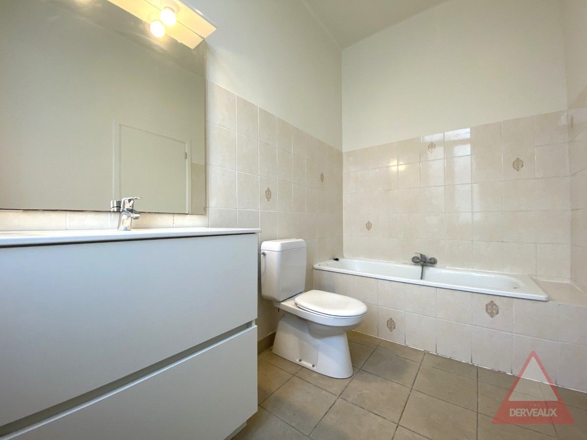 Heule – Woning met tuin op centrale ligging foto 8