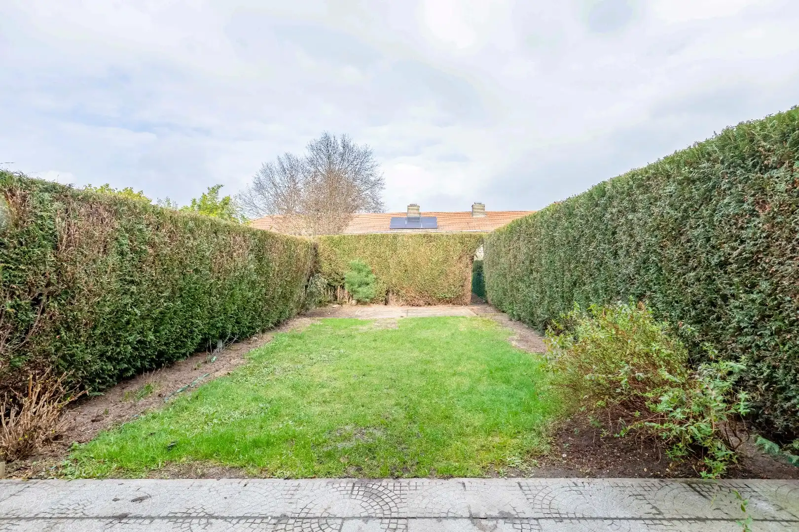 Gunstig gelegen instapklare woning in rij met garage en toffe tuin foto 17