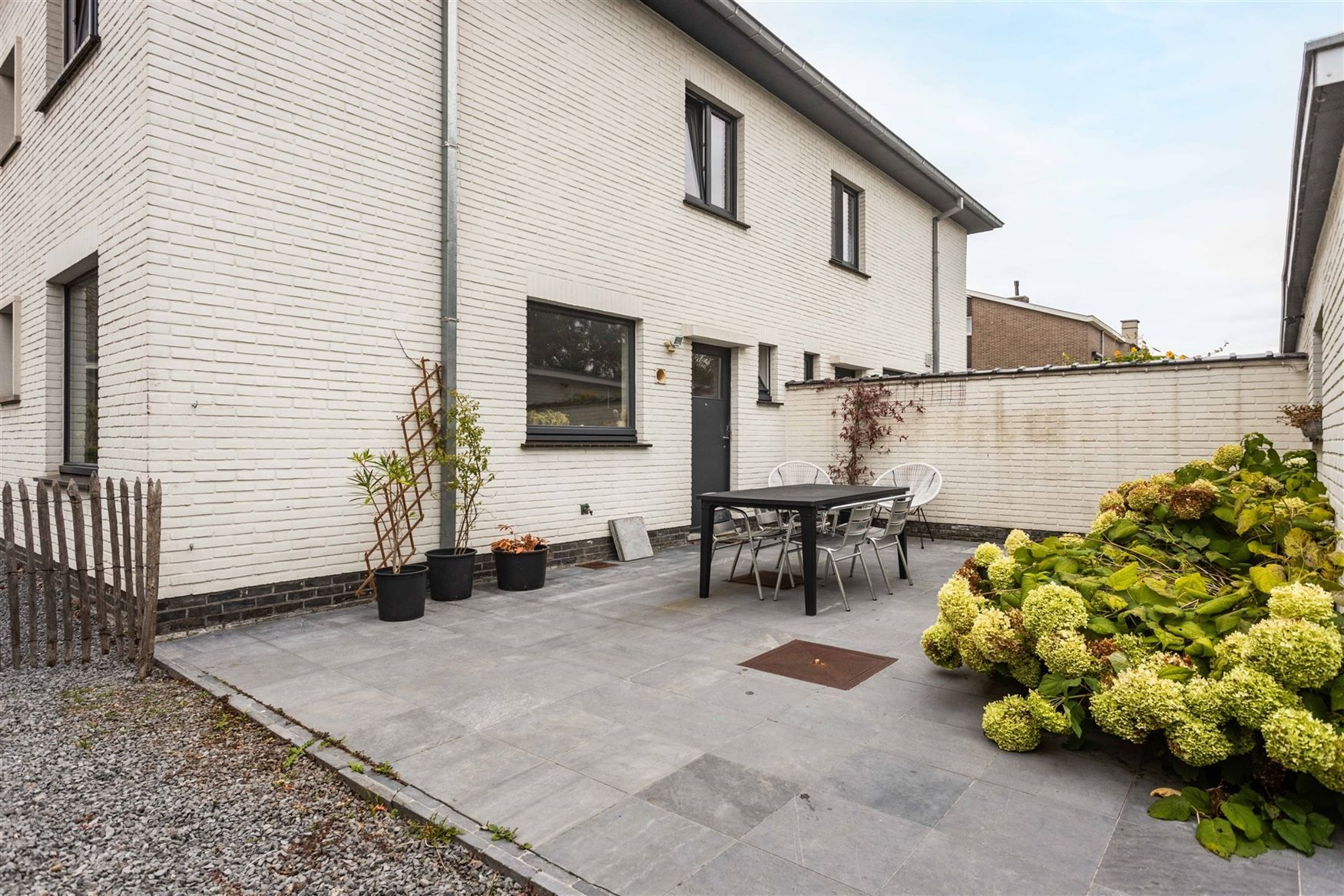 Charmante halfopen woning met tuin en garage te Drongen. foto 16