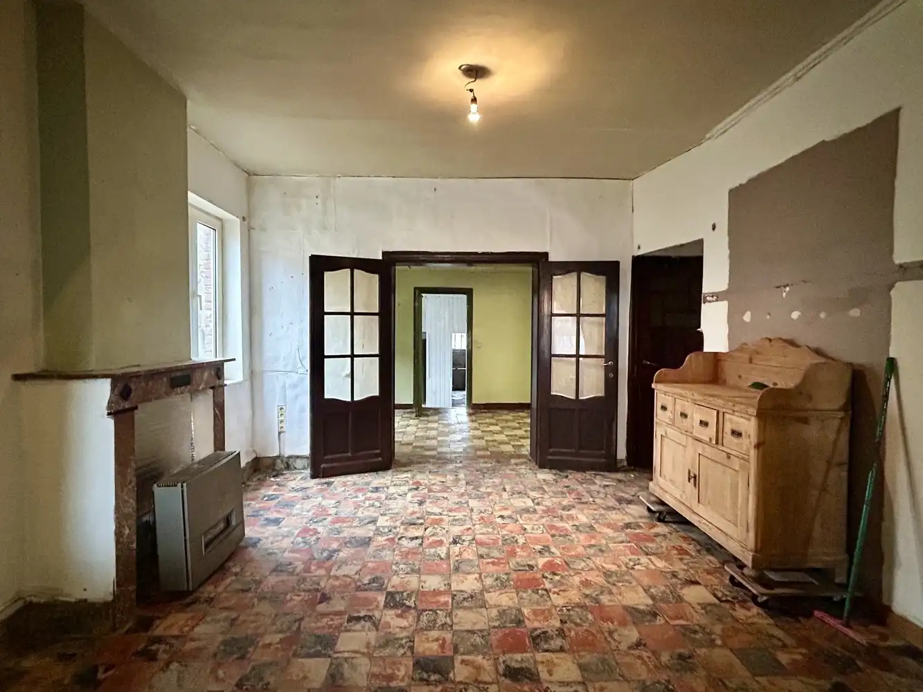 Te renoveren halfopen bebouwing met tuin - groot potentieel foto 6