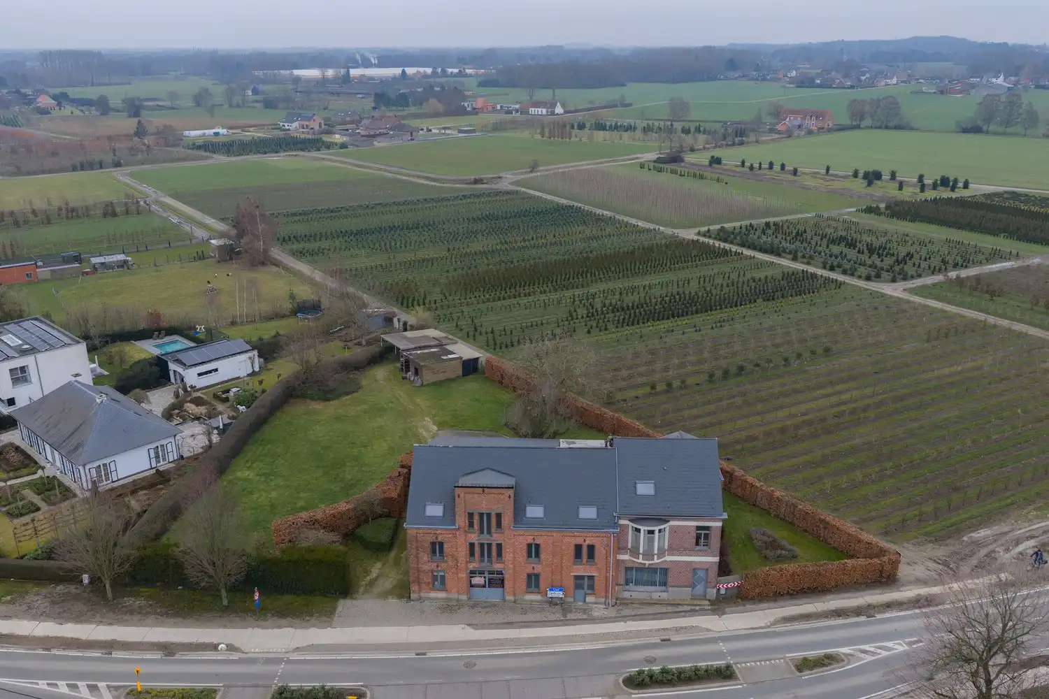 Zonevreemde woning met magazijn te Putte foto 30