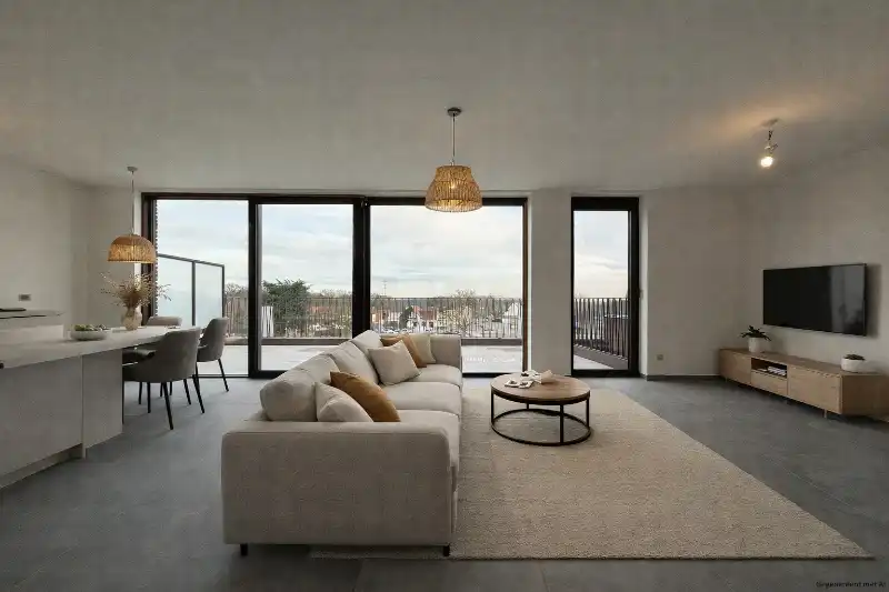 Prachtig BEN-penthouse met 1 slpk, terras, parking én zonnepanelen in het centrum van Houthalen foto {{pictureIndex}}