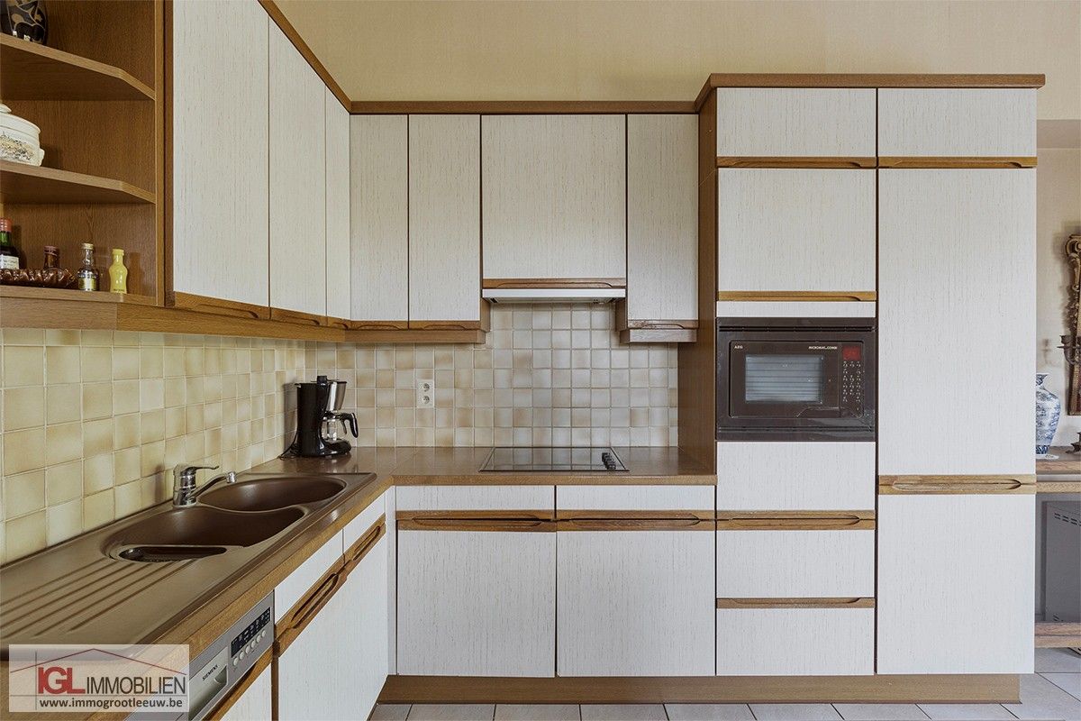 Charmante driegevelwoning met zonnige tuin & garage in het centrum van Lennik foto 7