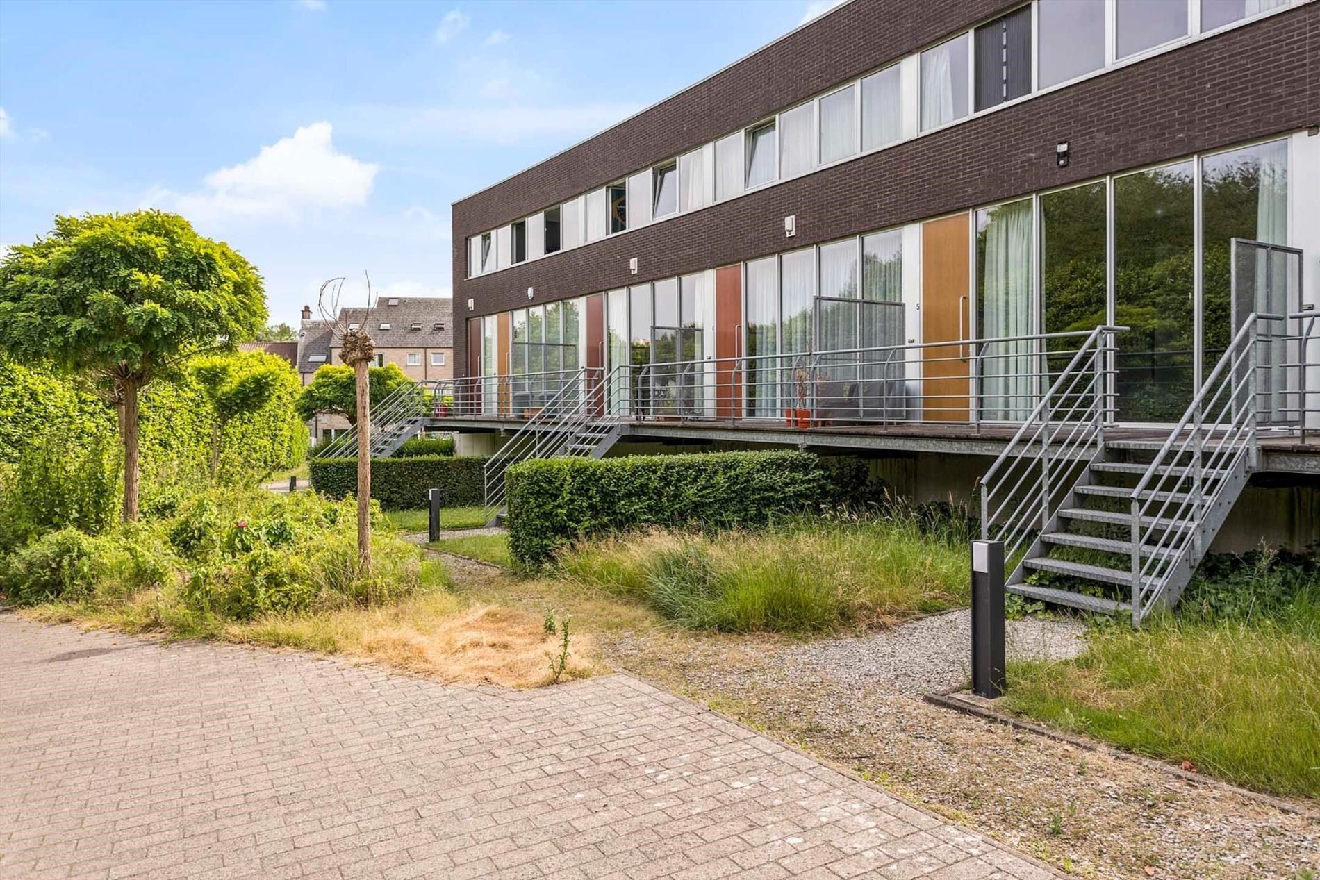 Dilbeek centrum: duplex appartement met 2 slaapkamers en tuintje foto 2