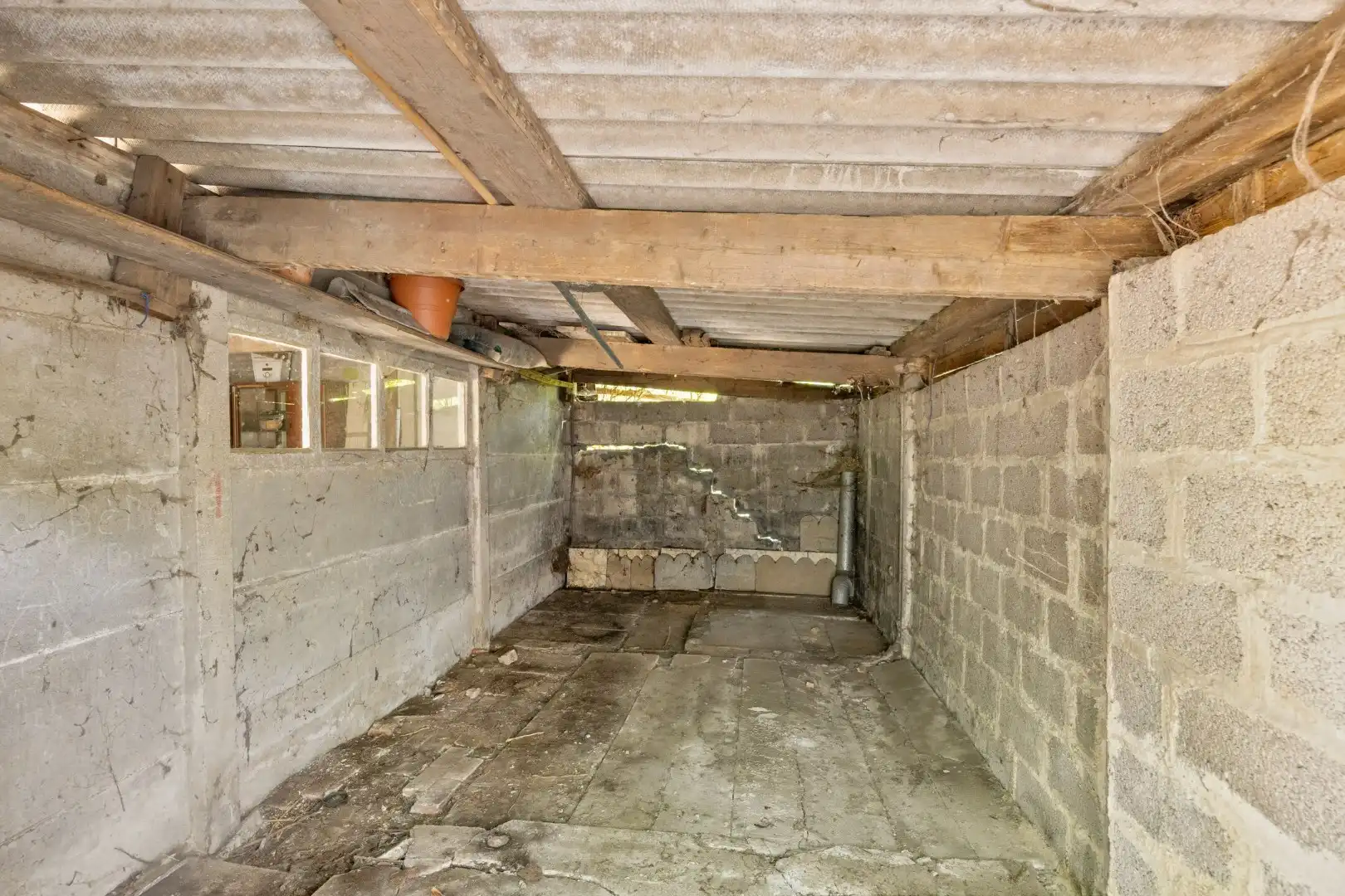 Ruime te renoveren woning met 3 slaapkamers in Lubbeek met doorgang langs het perceel van de buren. EPC: 736 KWH/m² foto 28