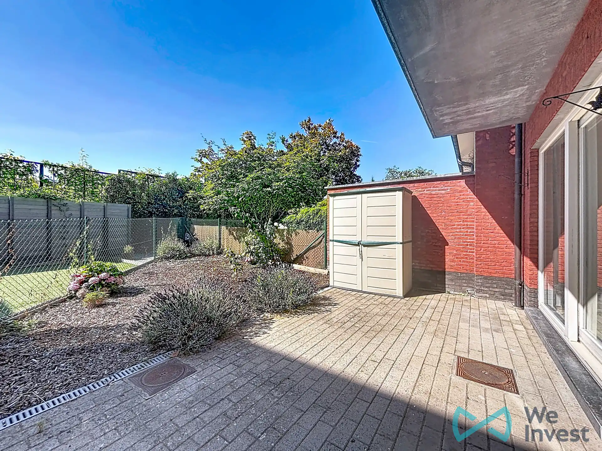 Gelijkvloers appartement met terras en tuin in Dilbeek foto 2