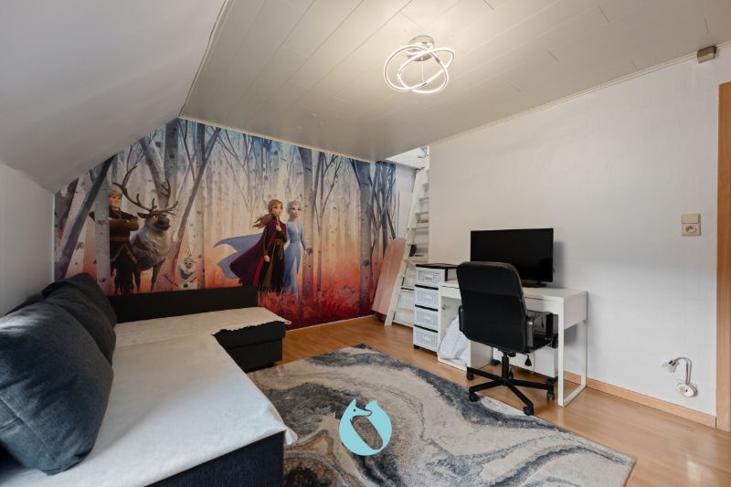 Rustig gelegen starterswoning met grote tuin foto 13