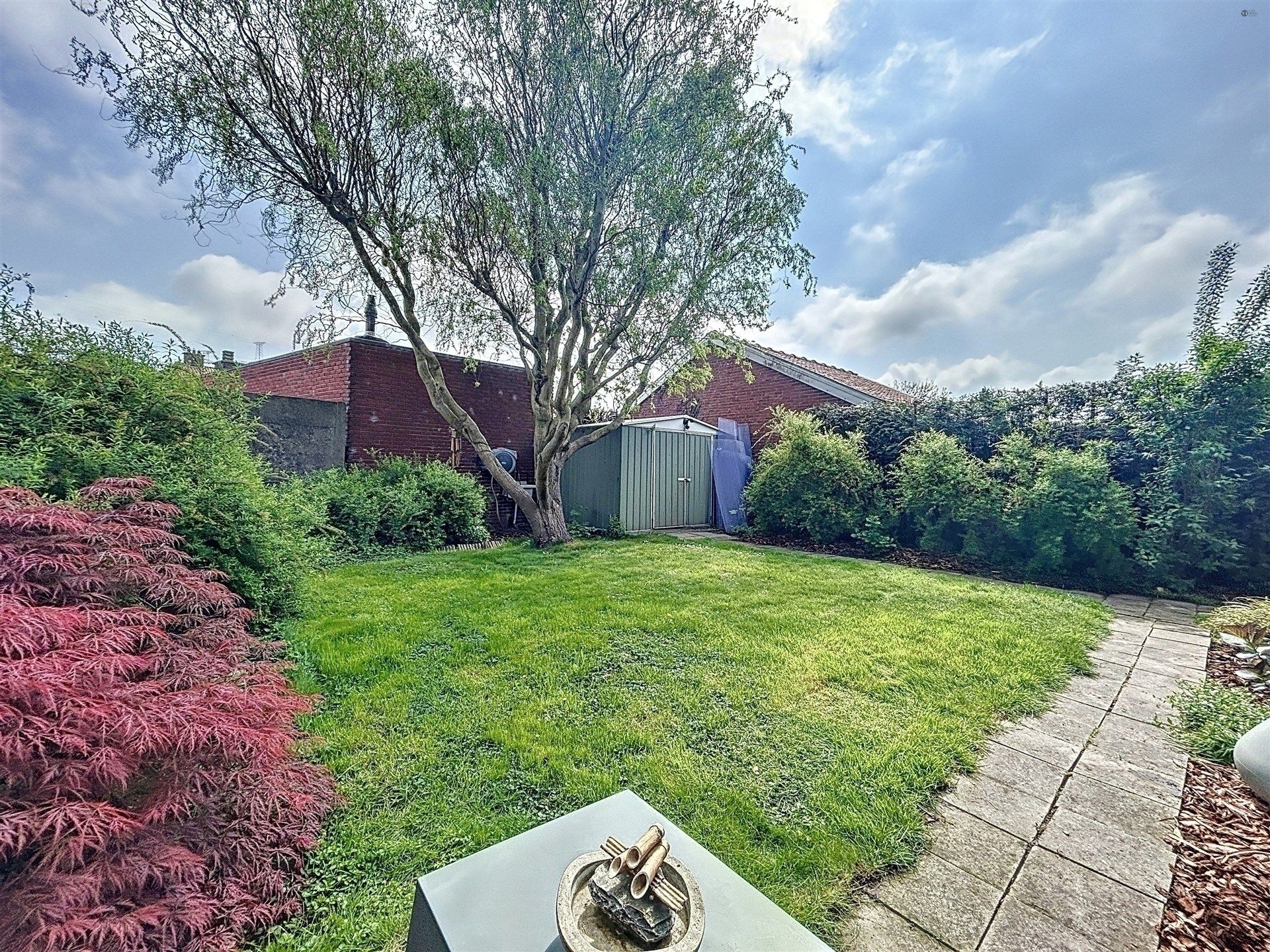 Recente energiezuinige  half-open bebouwing met 3 slp en gezellige tuin! foto 6