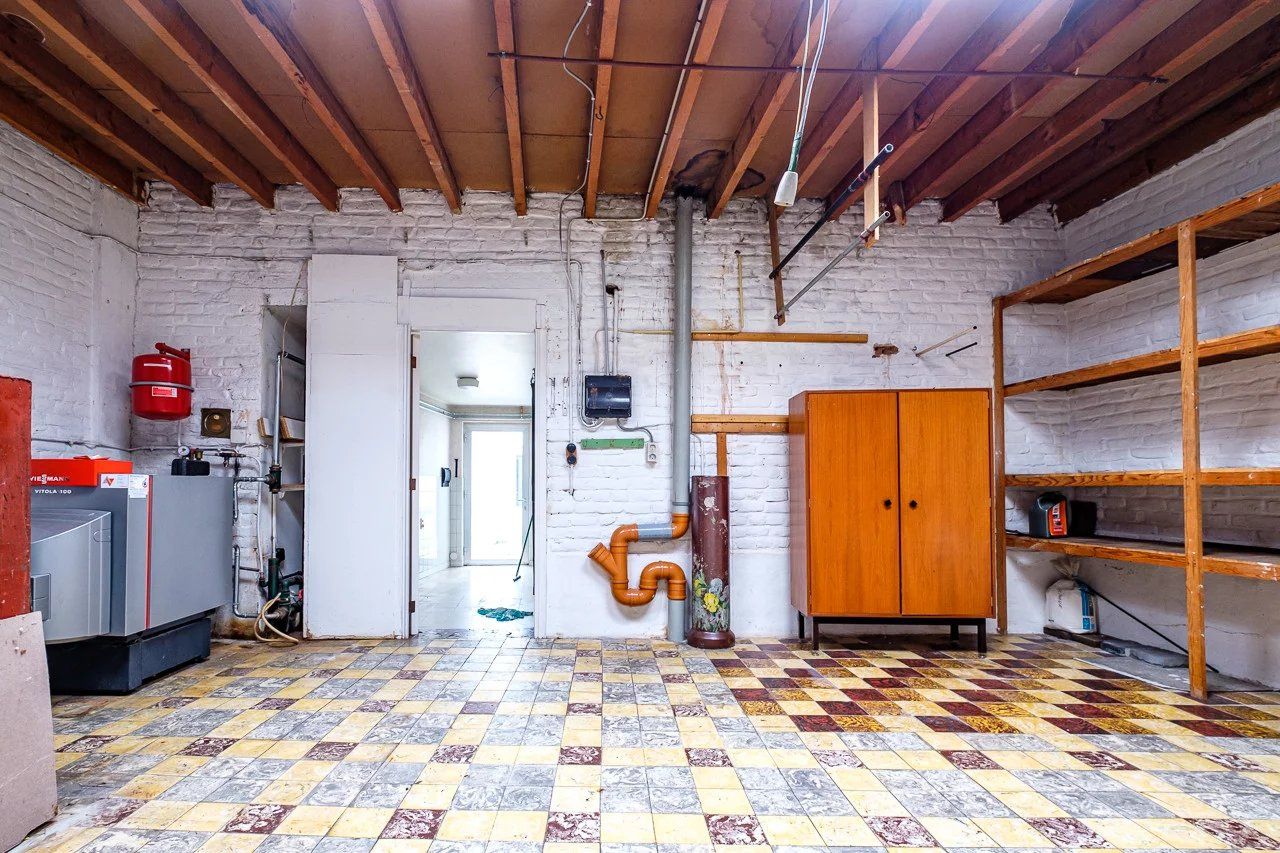 Te renoveren handelsruimte met woonst op toplocatie foto 11