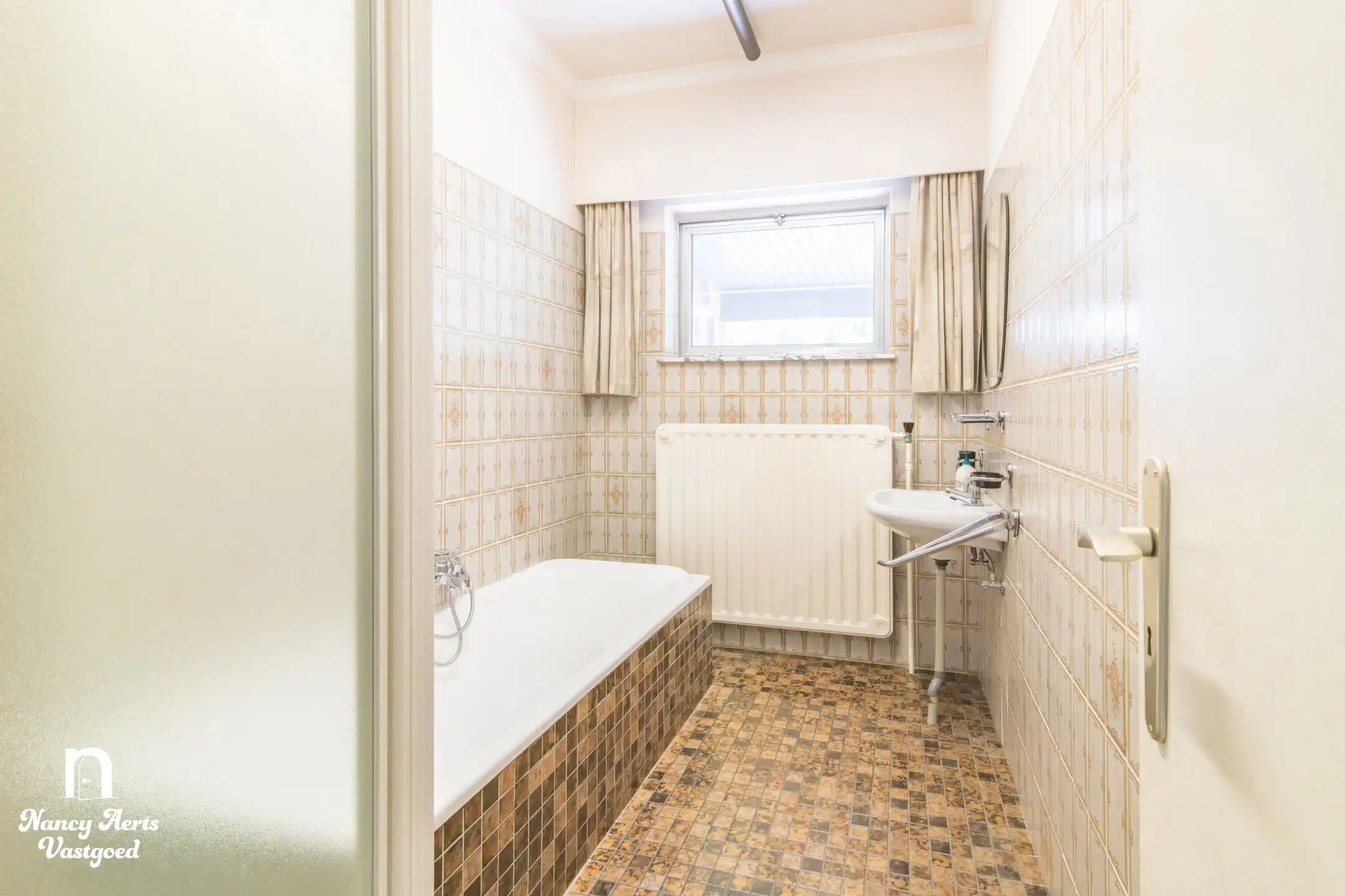 Uitstekend onderhouden split‑level woning in groene omgeving foto 17