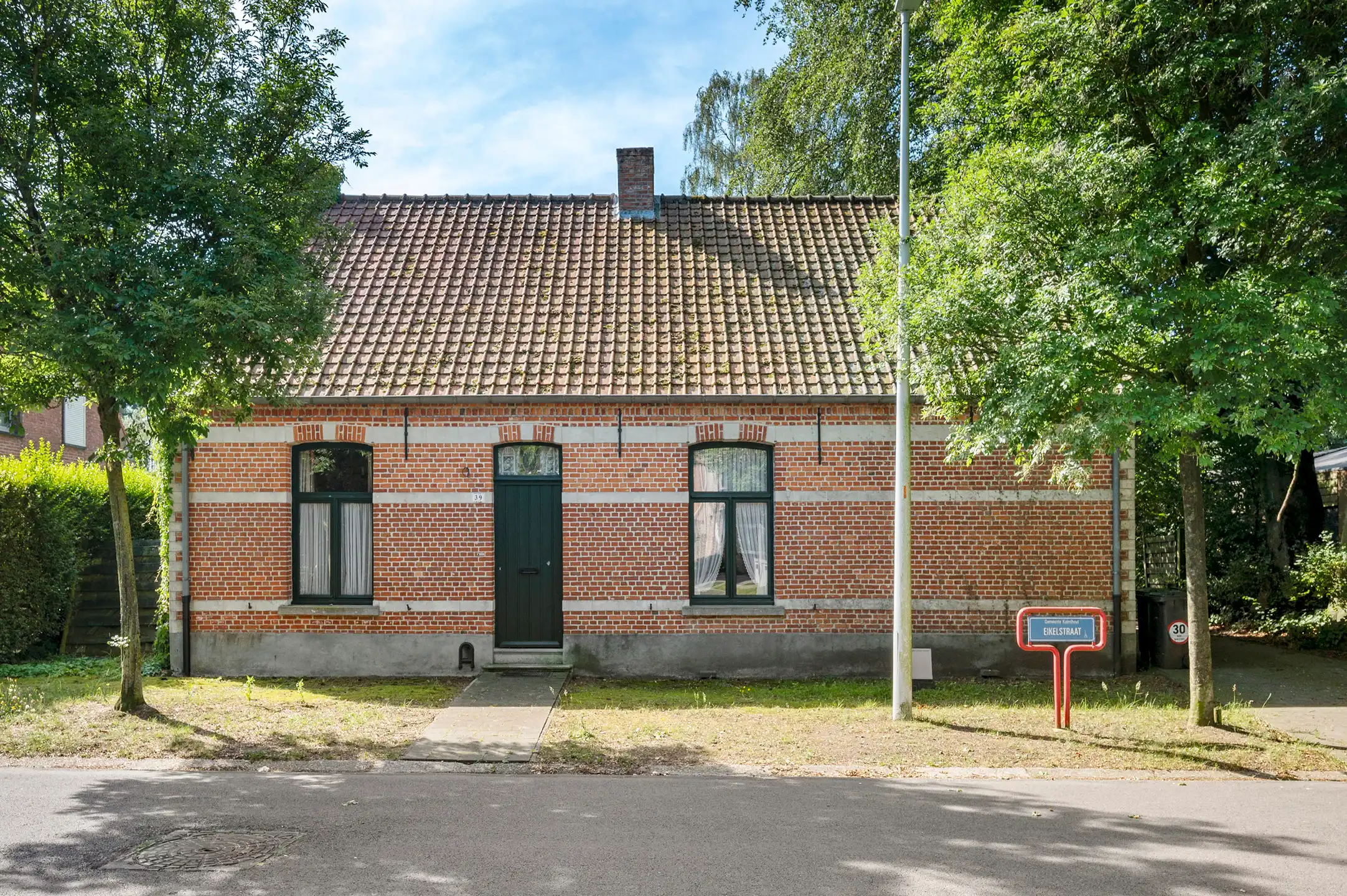 Karaktervolle woning op een toplocatie met diepe tuin en garage in een doodlopende straat nabij het centrum van Heide foto 36