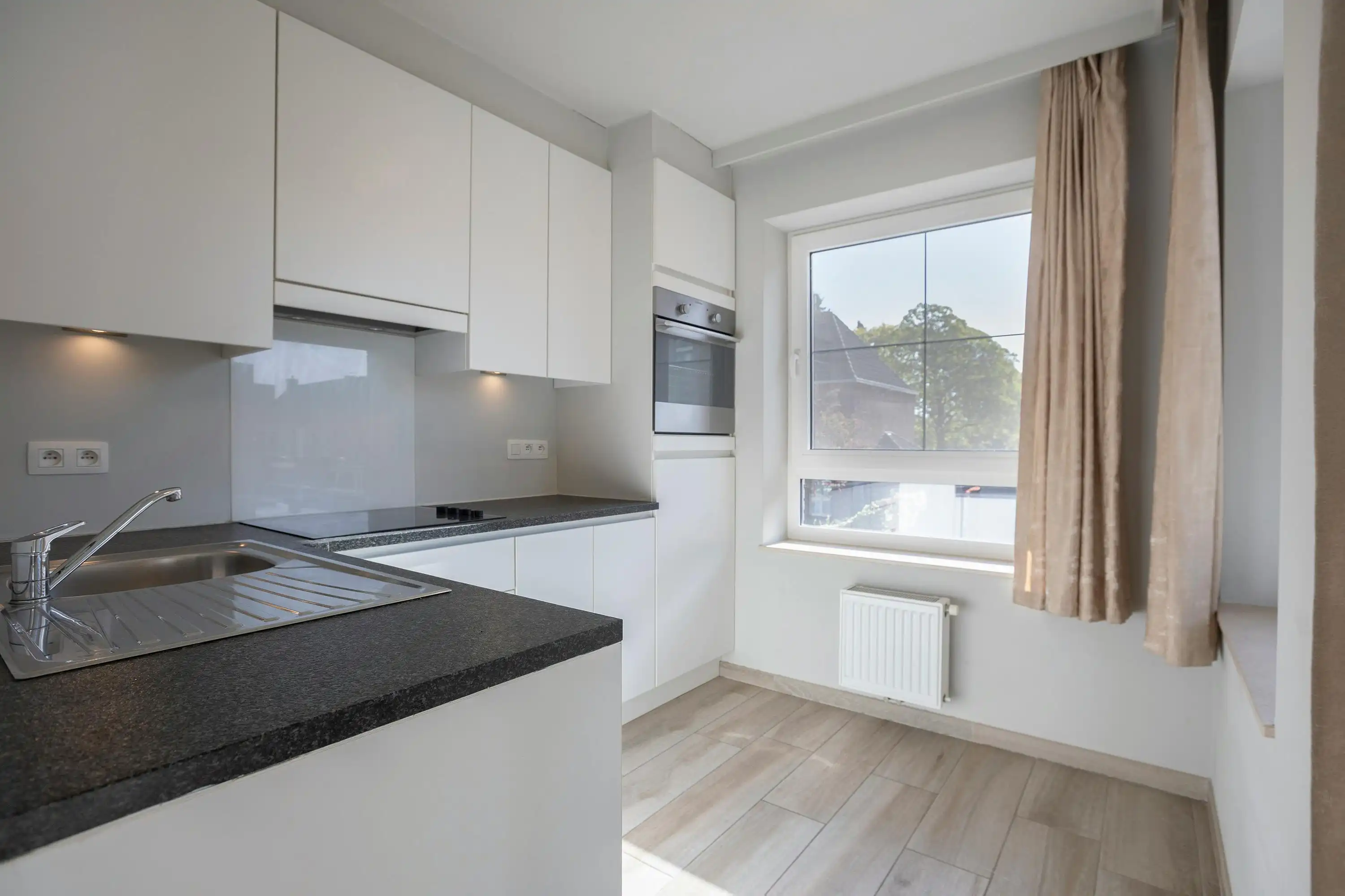 Instapklaar appartement met 2 slaapkamers in centrum Oostkamp foto 3