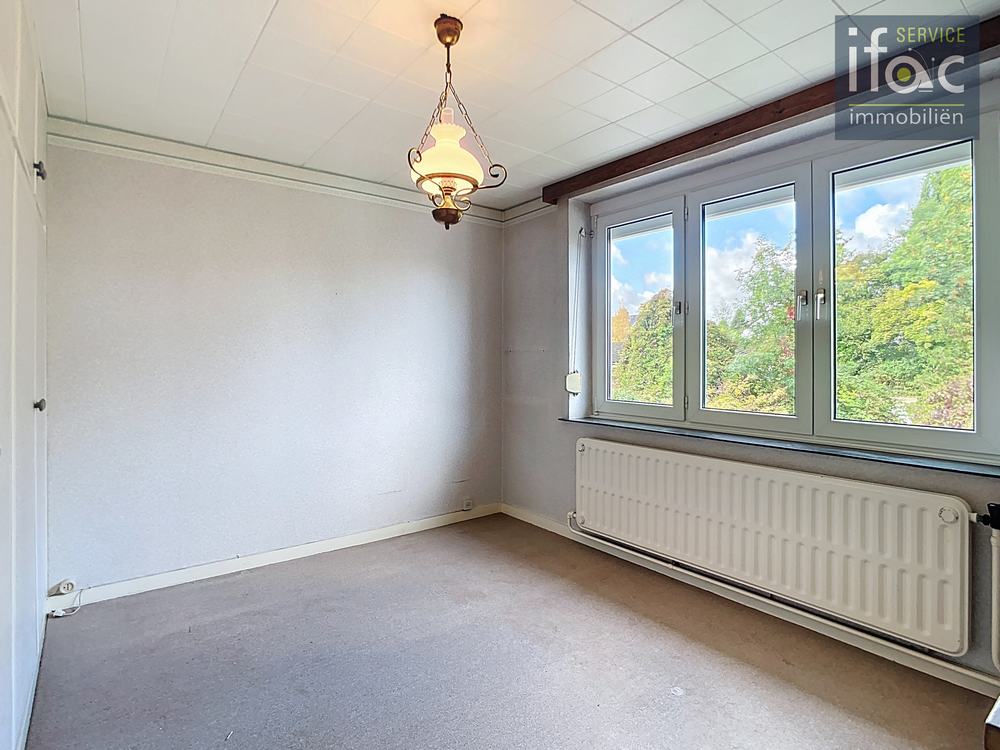 Rijhuis te koop foto 19
