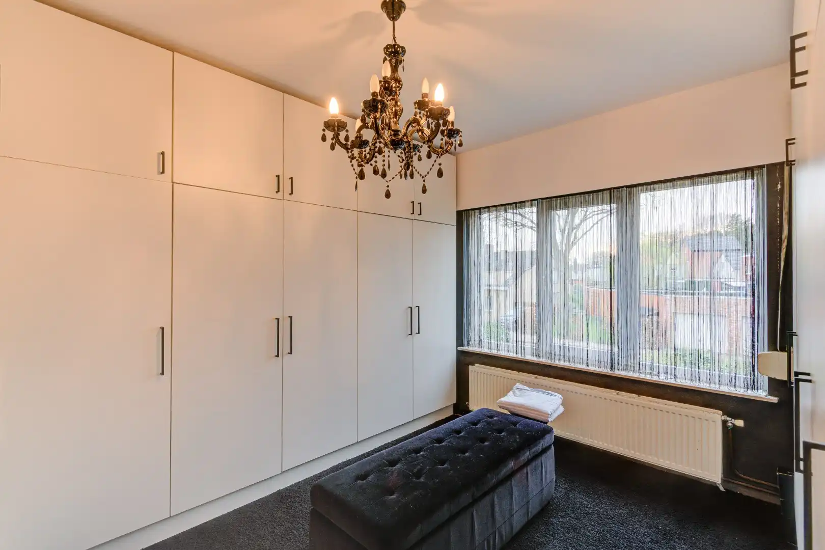 Half open woning in Schilde met zonnige tuin op het zuidwesten, terras en 4 slaapkamers, 1 badkamer en 4 parkeerplaatsen foto 16