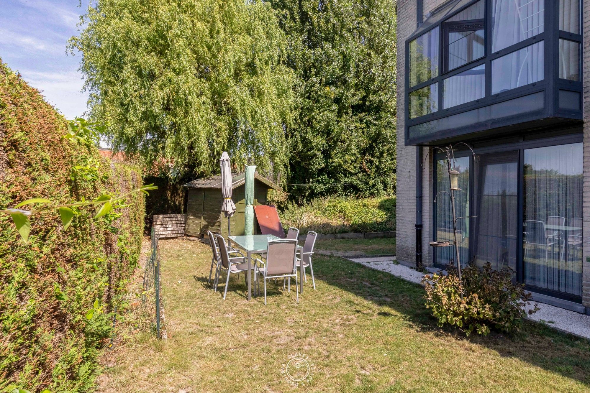 Ruim gelijkvloers appartement met tuin foto 16