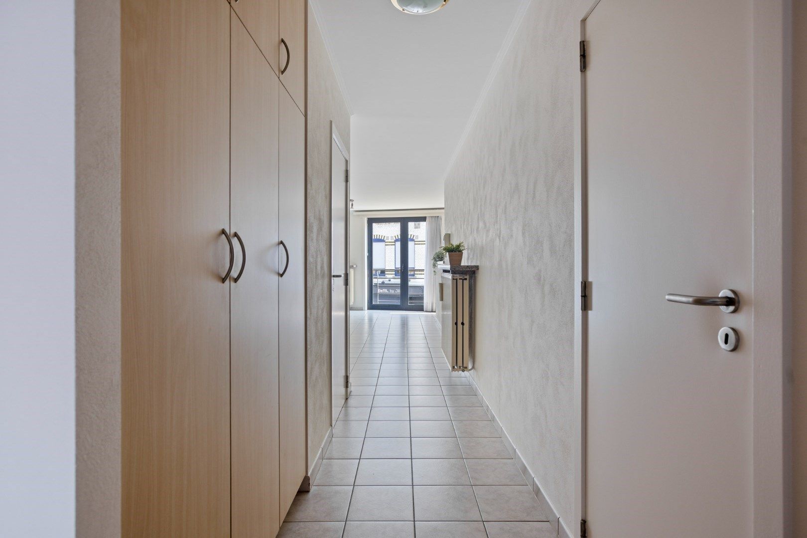 Mooi 2-slaapkamerappartement in hartje Menen! foto 10
